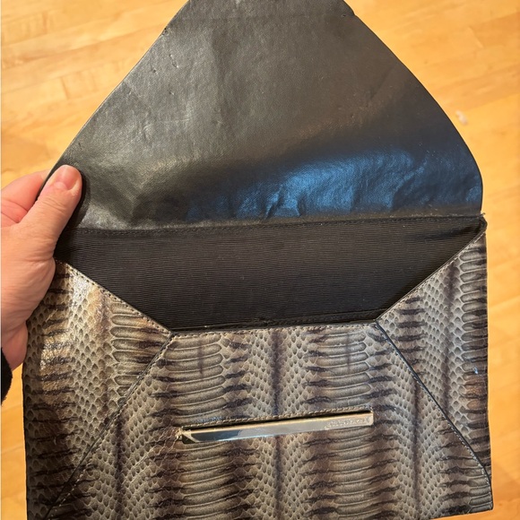 BCBG clutch Still has protective plastic on metal front detail comes w dust bag - Picture 2 of 3